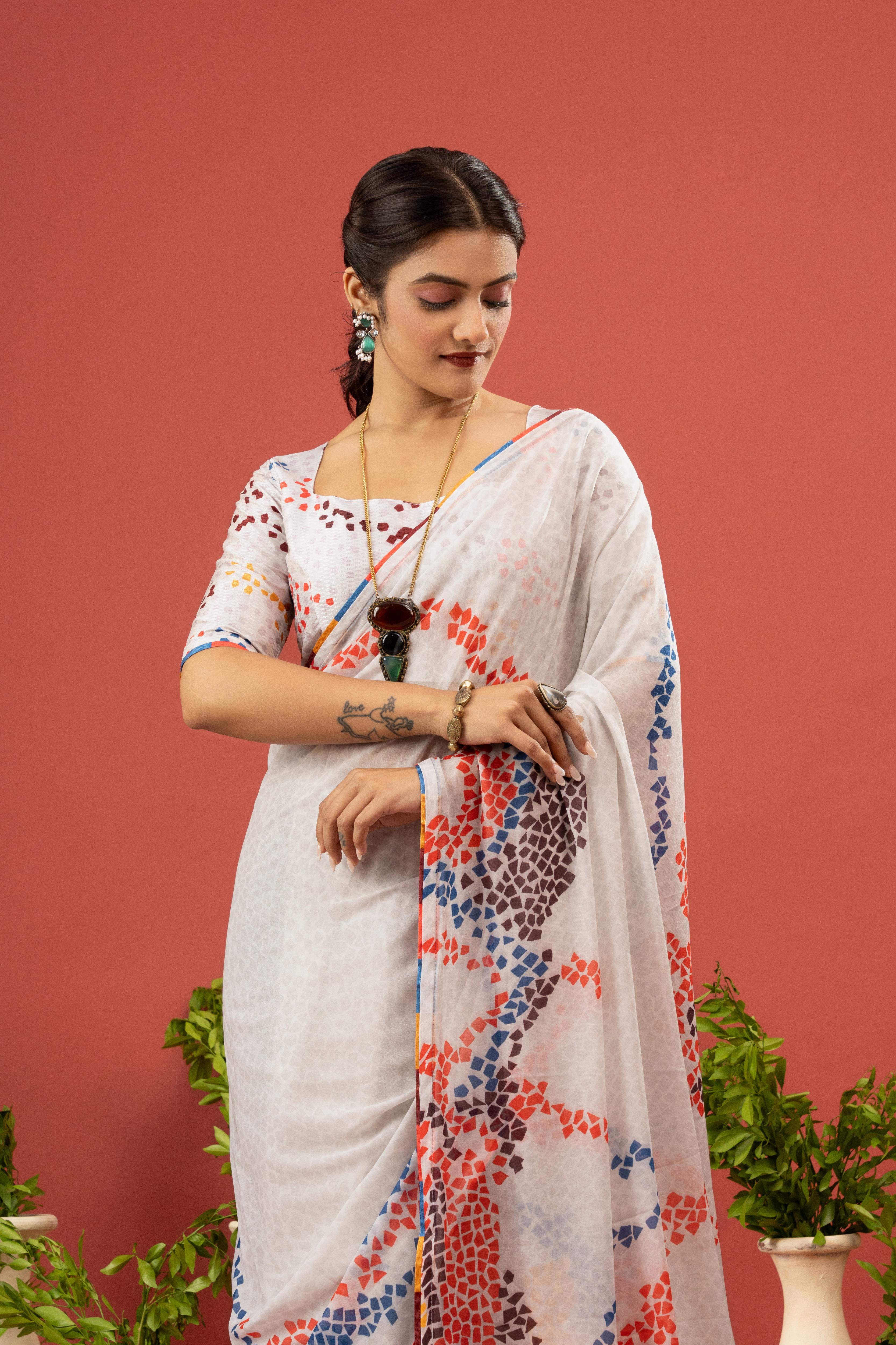 Graceful White Sparkle Georgette Saree