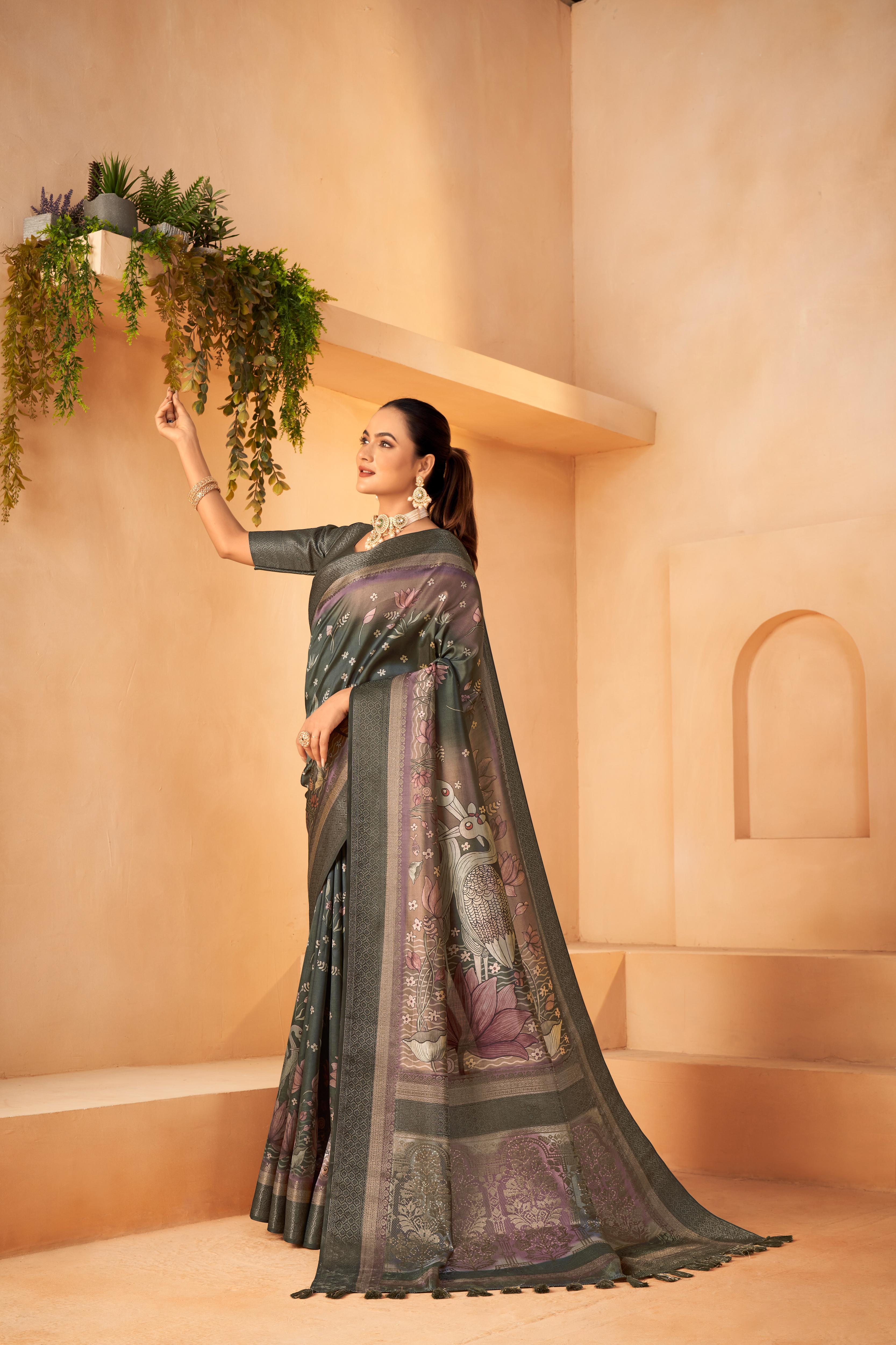 Green Saree with Silk fabric and Jacquard border is worn by a women 